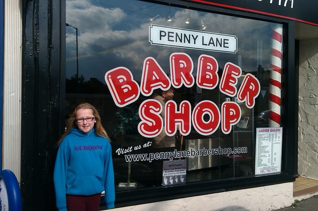 Me standing outside the Penny Lane Barber Shop in April 2013